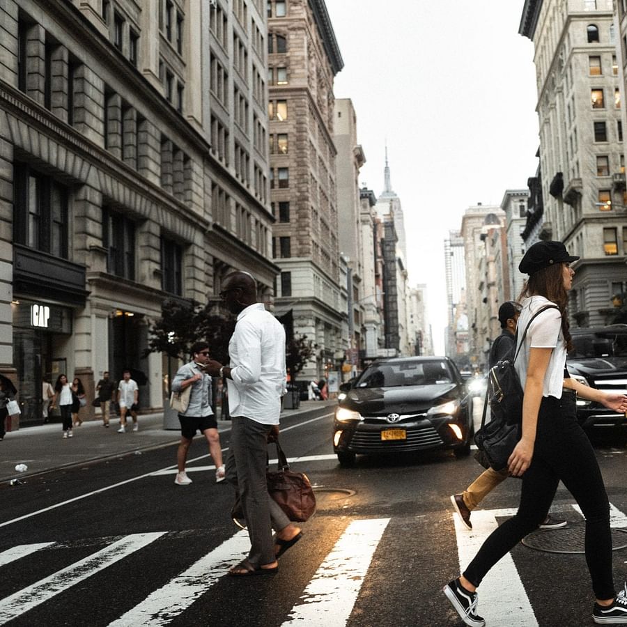 Pedestrian view of a bustling New York City neighborhood