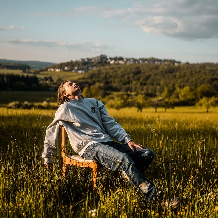 Group of friends exploring city on foot during car-free vacation